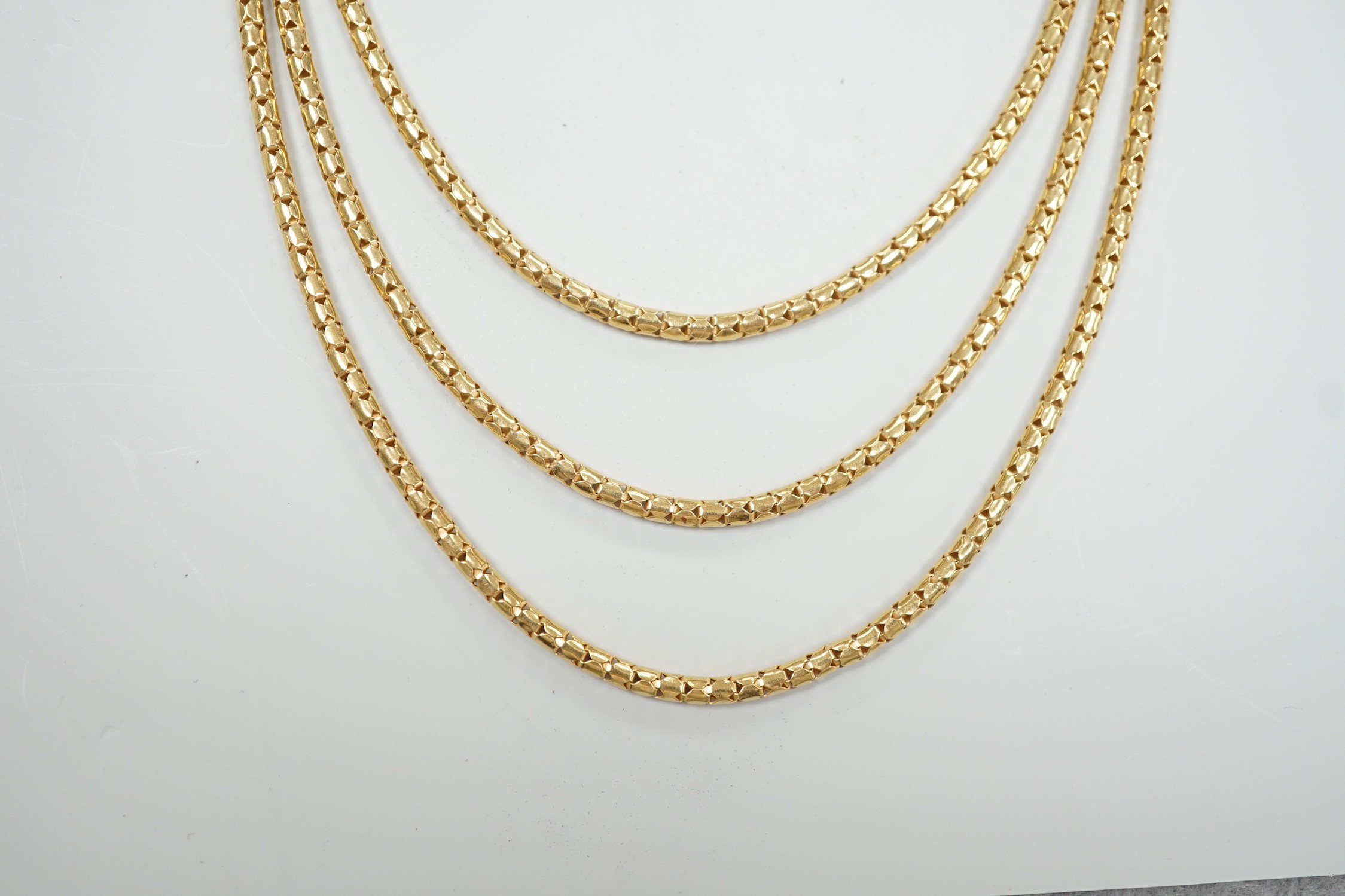 A modern 18ct gold three strand necklace, 43cm, 15.5 grams.